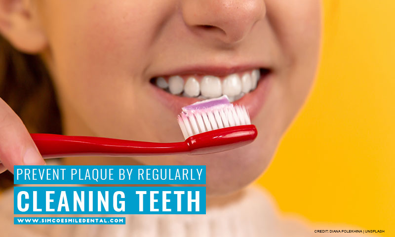 Prevent-plaque-by-regularly-cleaning-teeth What Does Your Mouth Say About Your Heart Health?