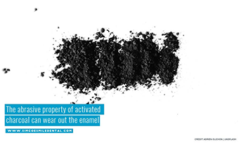 The abrasive property of activated charcoal can wear out the enamel
